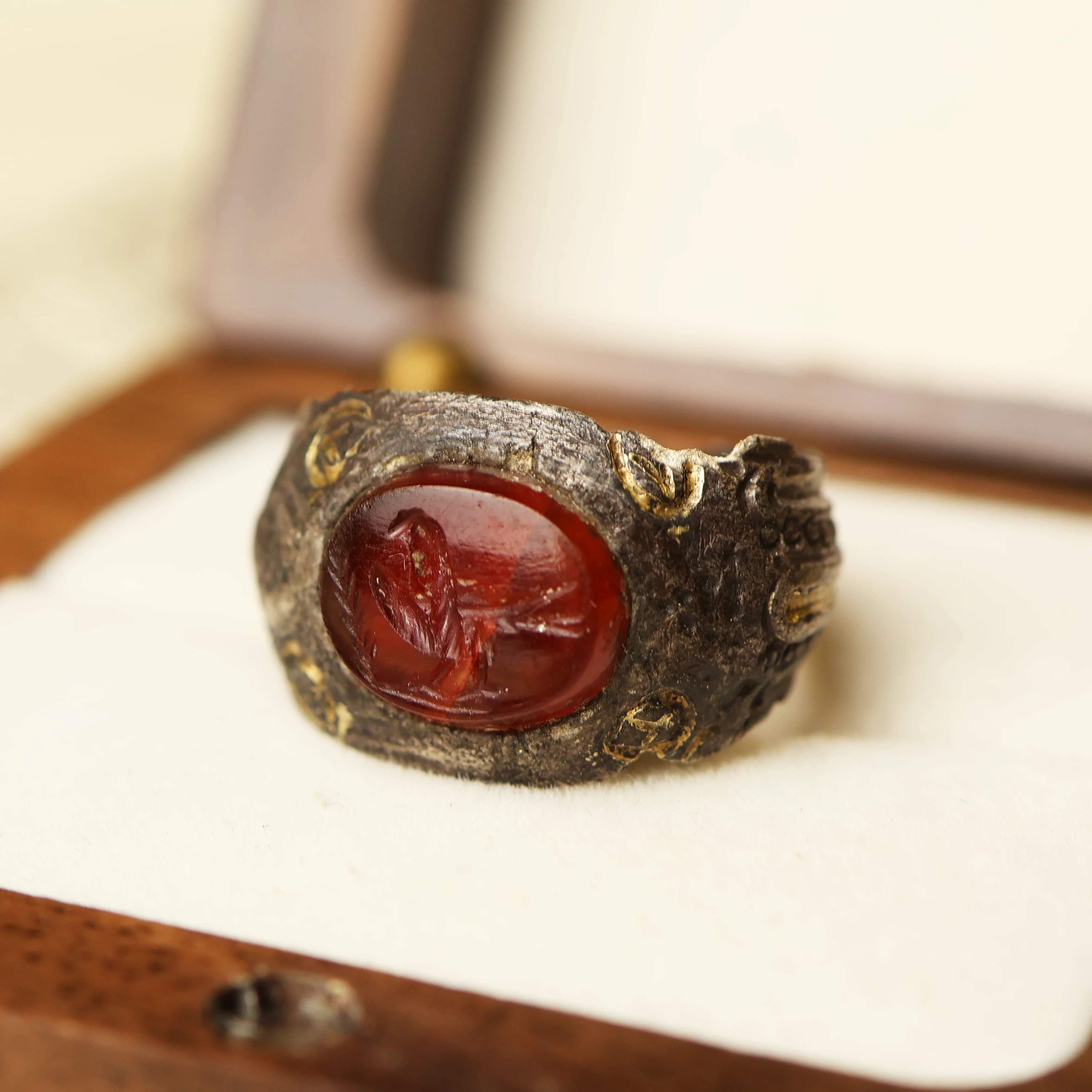Roman Silver Ring with Garnet Intaglio of a Bird